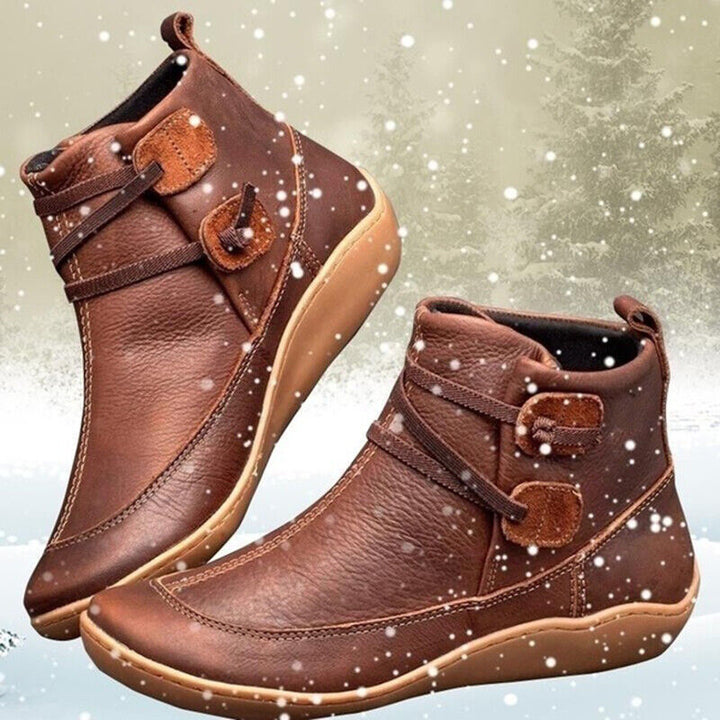 Women's ankle boots with chic button detail. Orthopedic design ensures maximum comfort and support.