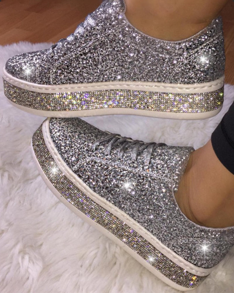 Women's stylish platform glitter sneakers, offering all-day comfort for fashion-forward casual chic street style.