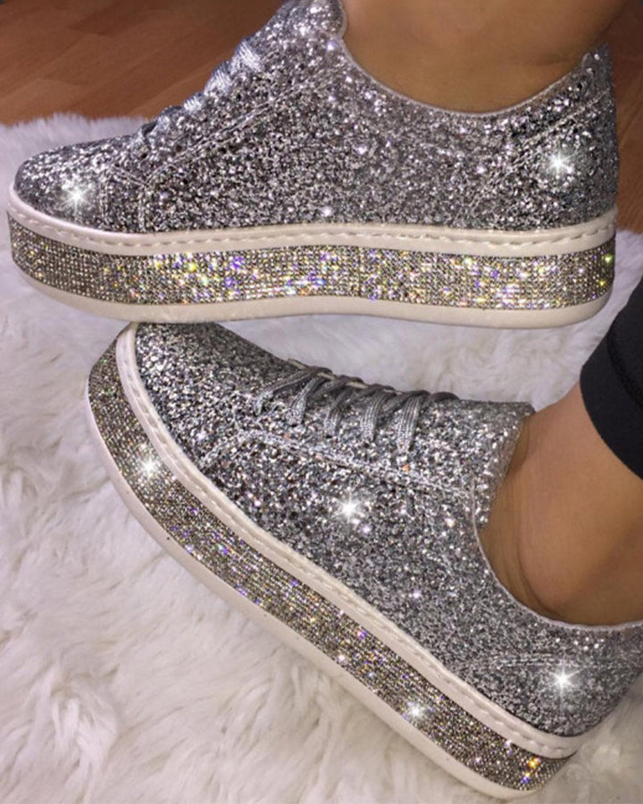 Women's stylish platform glitter sneakers, offering all-day comfort for fashion-forward casual chic street style.