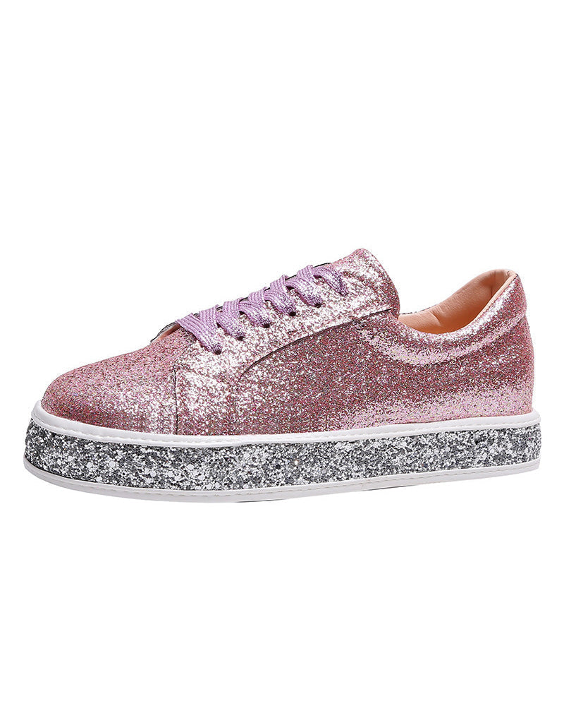 Dazzling women's glitter platform sneakers, ensuring stylish all-day comfort for a modern fashion statement.