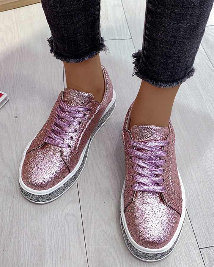 Cushioned women's platform glitter sneakers, offering all-day comfort & a stylish, sparkling look for fashion.