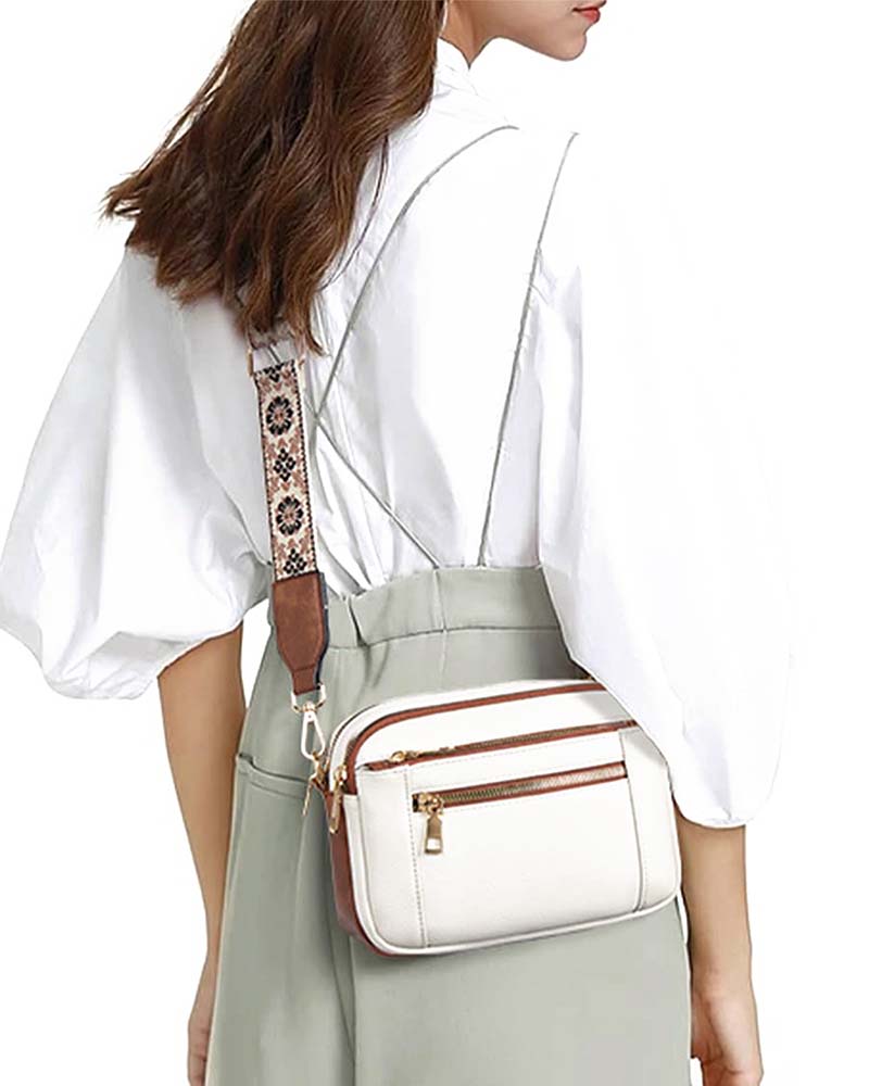 Back view of women's black PU leather crossbody bag, highlighting the smooth finish