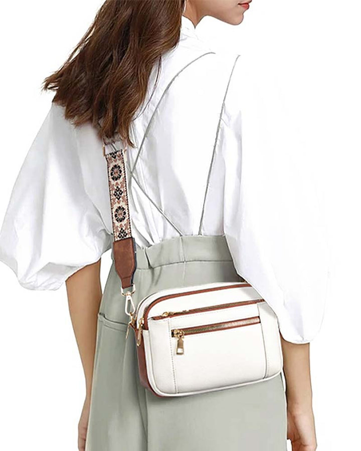 Back view of women's black PU leather crossbody bag, highlighting the smooth finish