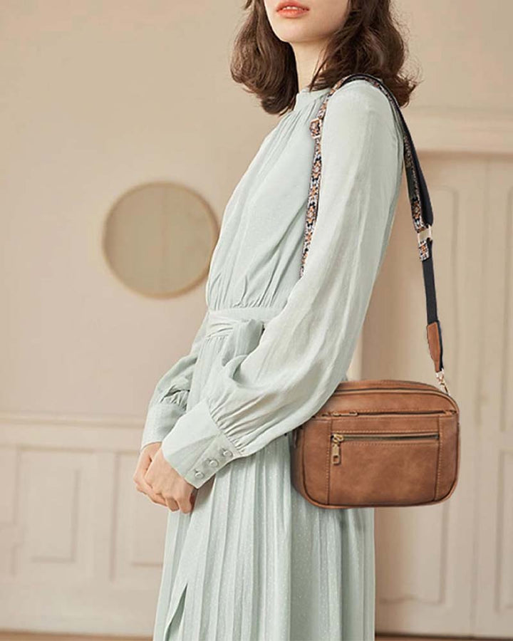 Stylish women's black crossbody bag made of durable PU leather, suitable for daily use