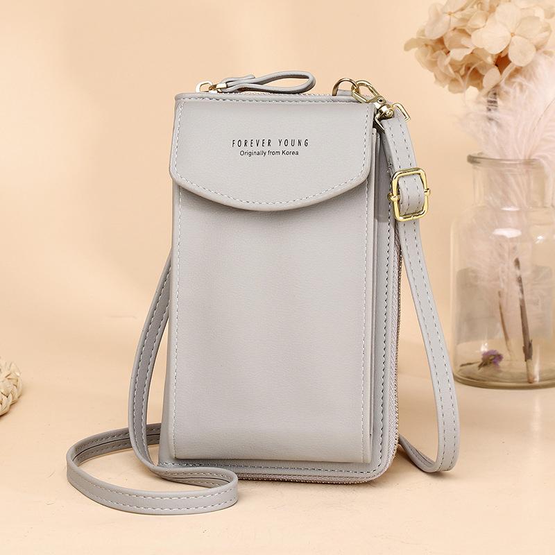 Front flap detail of the women's PU leather crossbody wallet, with a subtle logo