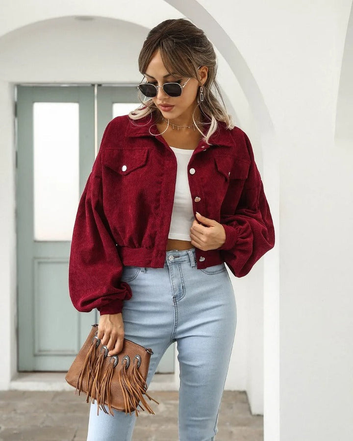 Amira short style ladies jacket with puff sleeves. A chic, cropped outerwear piece for everyday stylish fashion.