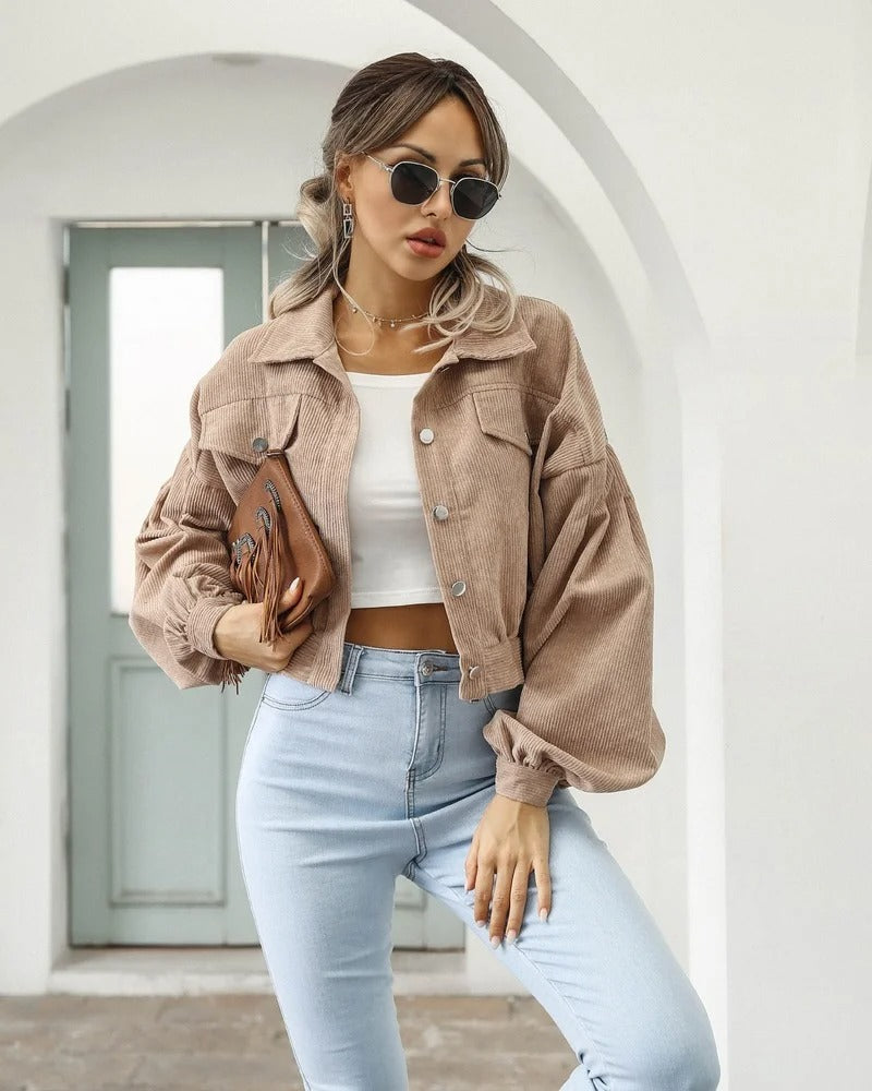 Women's cropped puff sleeve jacket in a short style, 'Amira,' offering a modern, casual look for fashion-forward women.