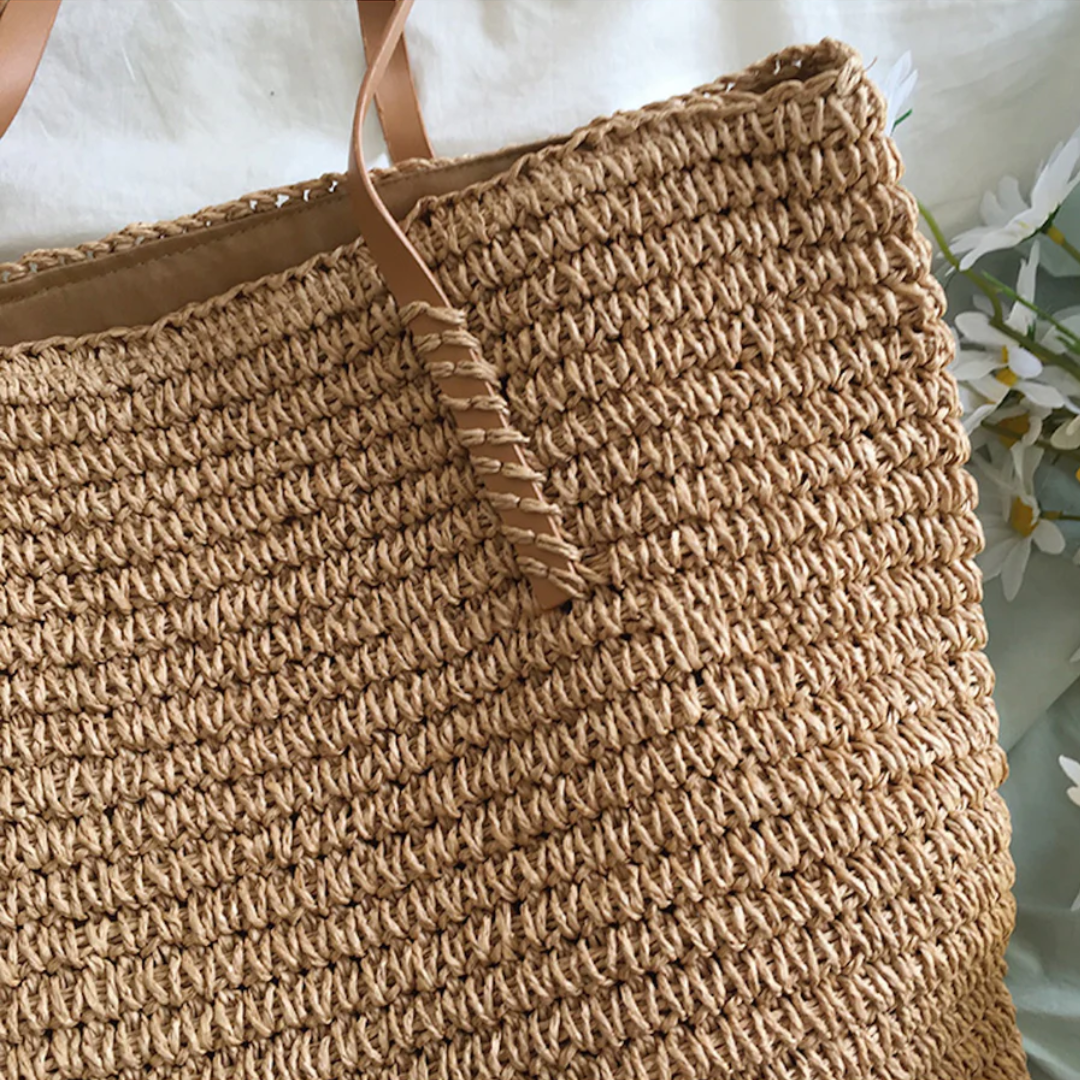 Versatile brown shoulder bag, an elegant purse with ample storage for daily use.