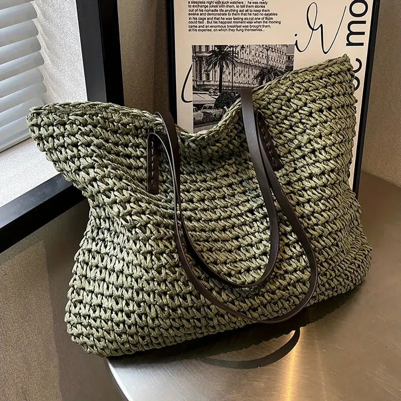 Women's stylish straw beach tote bag, perfect for summer travel & casual outings.