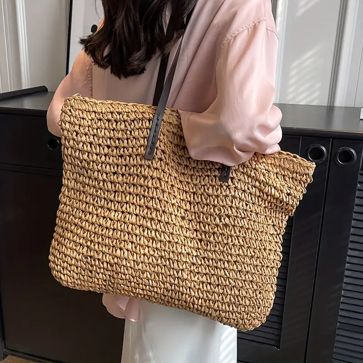 Fashionable women's summer beach tote bag, stylish & practical for travel and casual wear.