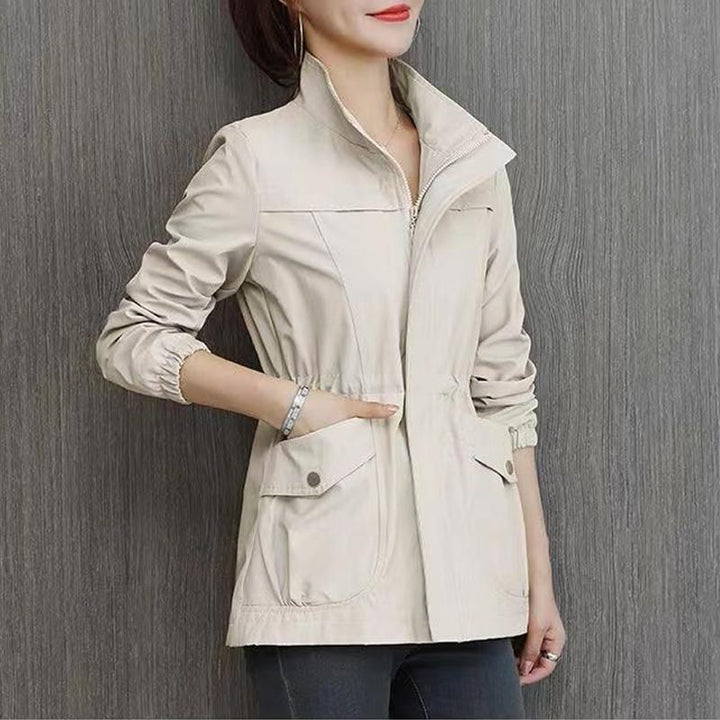 Women's stylish transitional jacket with stand-up collar, perfect for autumn fashion and casual outerwear.