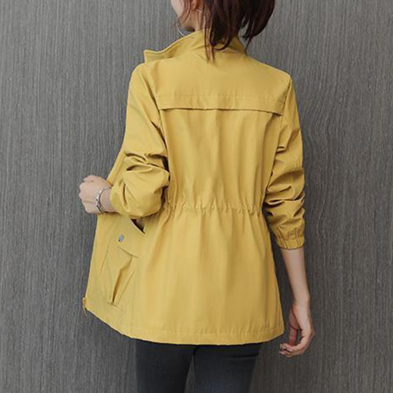 Fashionable women's fall jacket, a versatile stand-up collar transitional piece for modern casual style.
