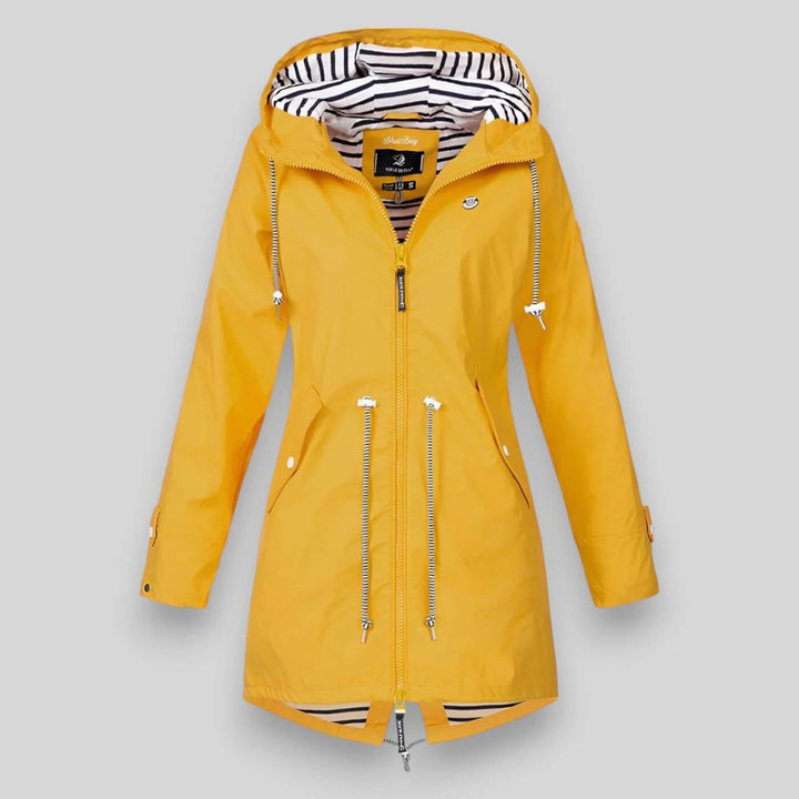 Lightweight women's waterproof jacket. Durable & stylish hooded design, ideal for rainy spring and fall days.