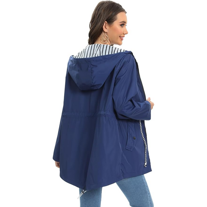 Elegant women's lightweight waterproof rain jacket. Durable outerwear, ideal for stylish weather protection.