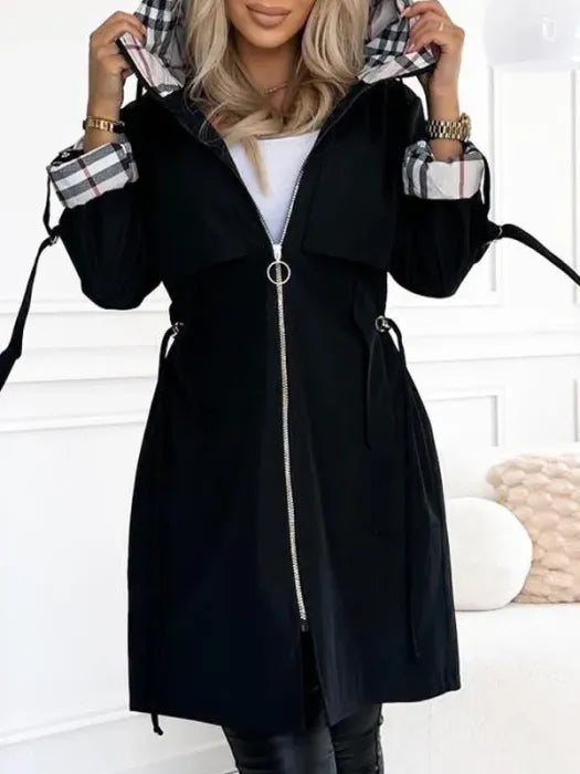 Durable women's windproof and waterproof zip coat, ideal stylish outerwear for severe weather protection in winter.