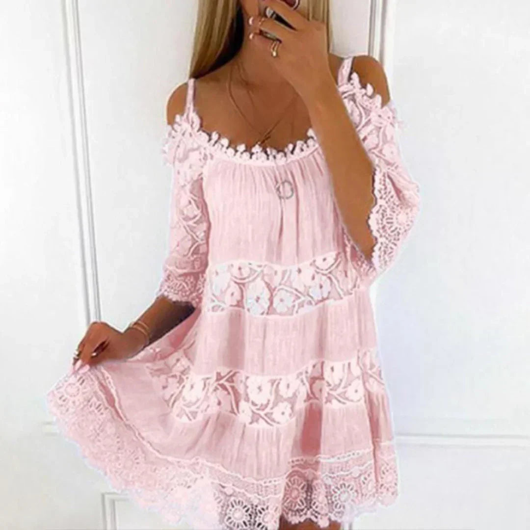 Casual women's spring fashion mini dress, short sleeve with crochet lace and cold shoulder. A versatile summer sundress.