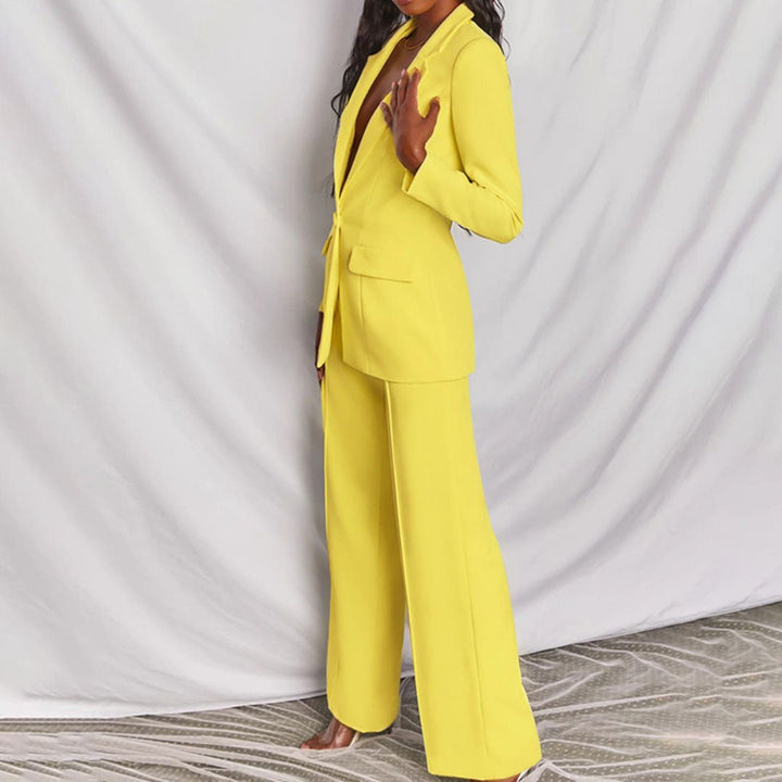 Chic women's tailored blazer and trousers set, a complete professional outfit for versatile styling.