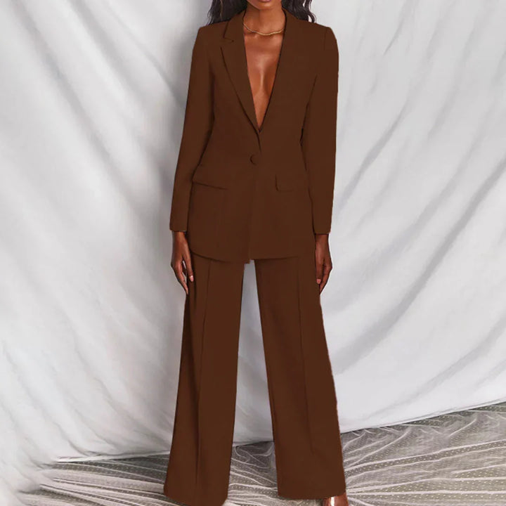 Women's fashion longline tailored blazer and wide-leg trouser suit. Professional and chic two-piece set.