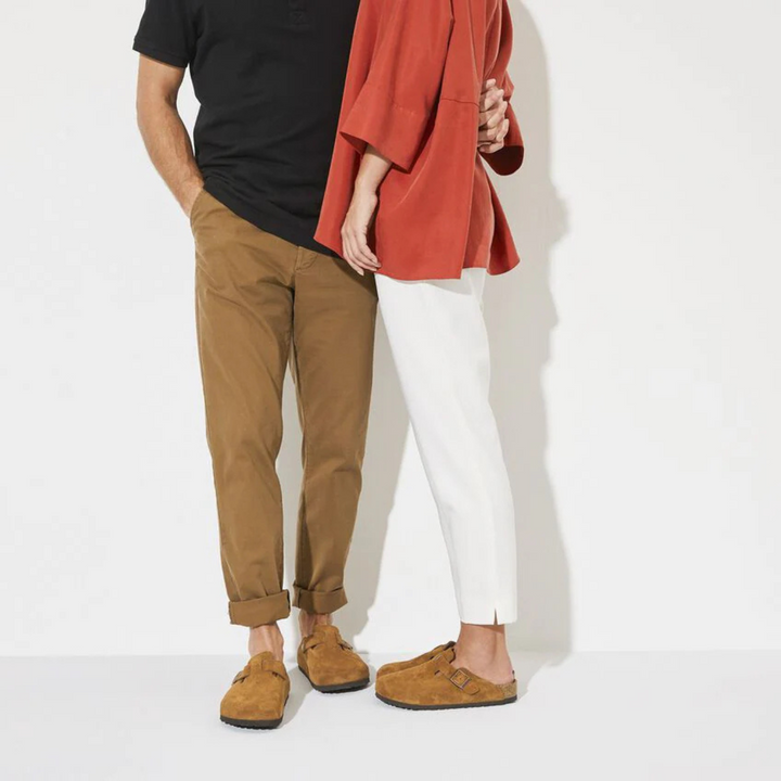 Top view of women's taupe slip-on clogs, highlighting the casual style and easy-to-wear design.