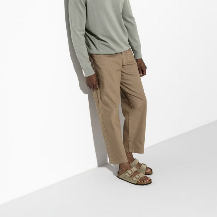 Summer-ready taupe women's sandals. Ergonomic design and adjustable straps ensure all-day comfort.