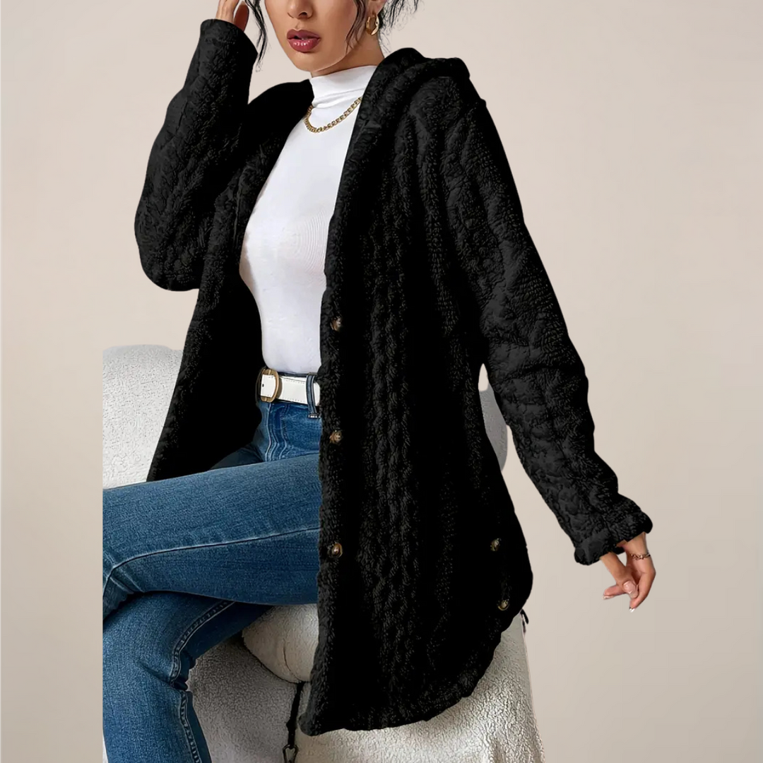 Casual women's hooded cardigan, longline style, featuring a unique textured knit pattern.