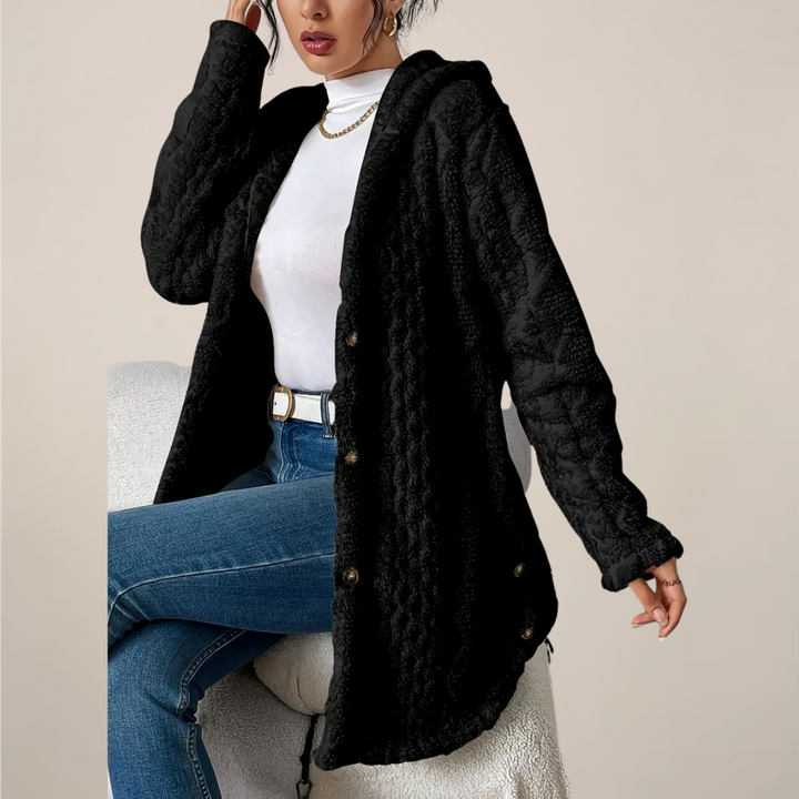 Casual women's hooded cardigan, longline style, featuring a unique textured knit pattern.