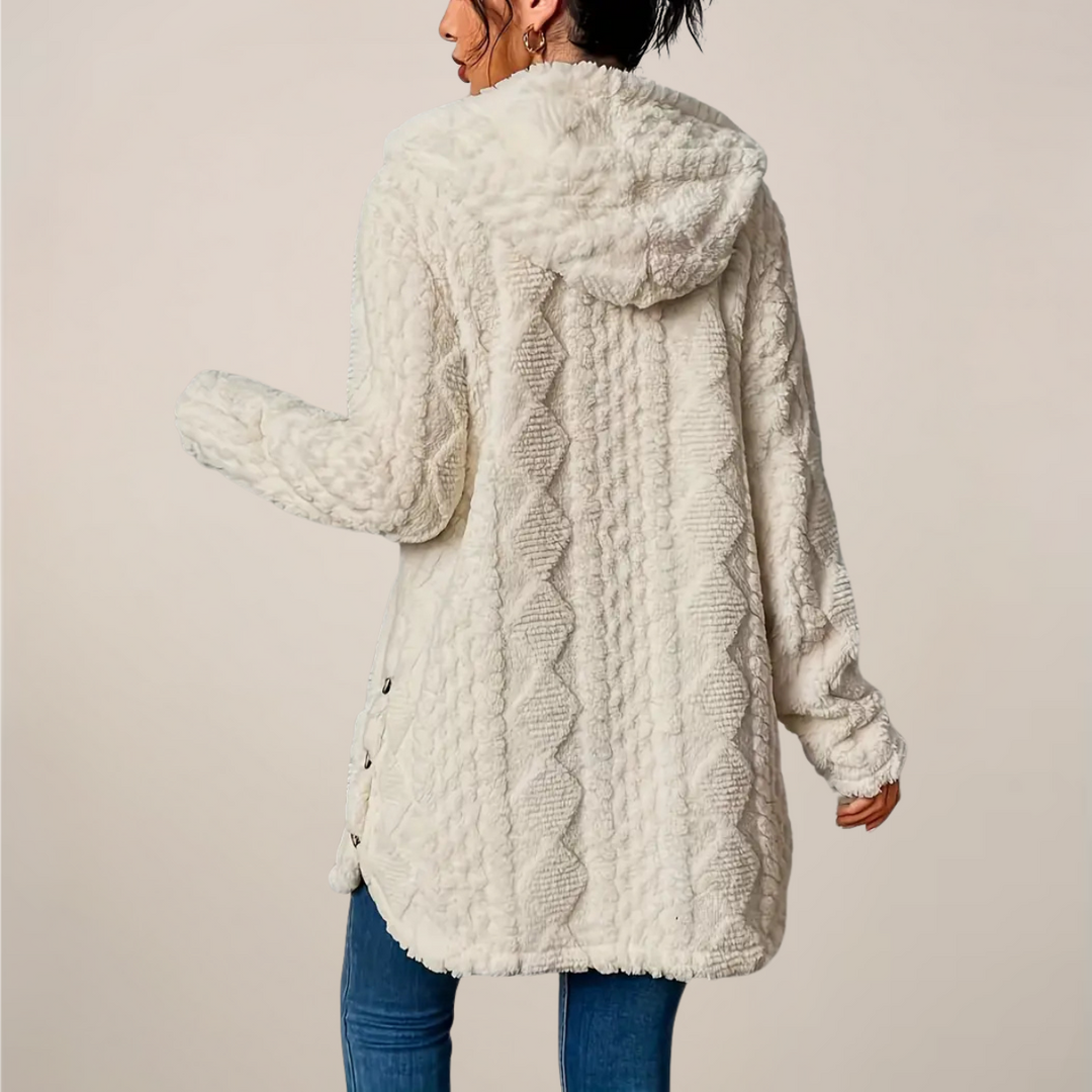 Lightweight longline hooded cardigan for women, textured knit, ideal for a casual spring outfit.