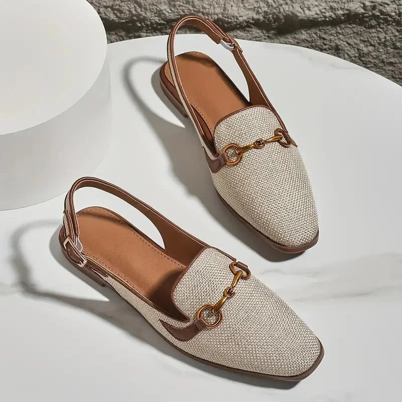 Comfortable women's textured slingback loafers with a flat sole, perfect for all-day wear.