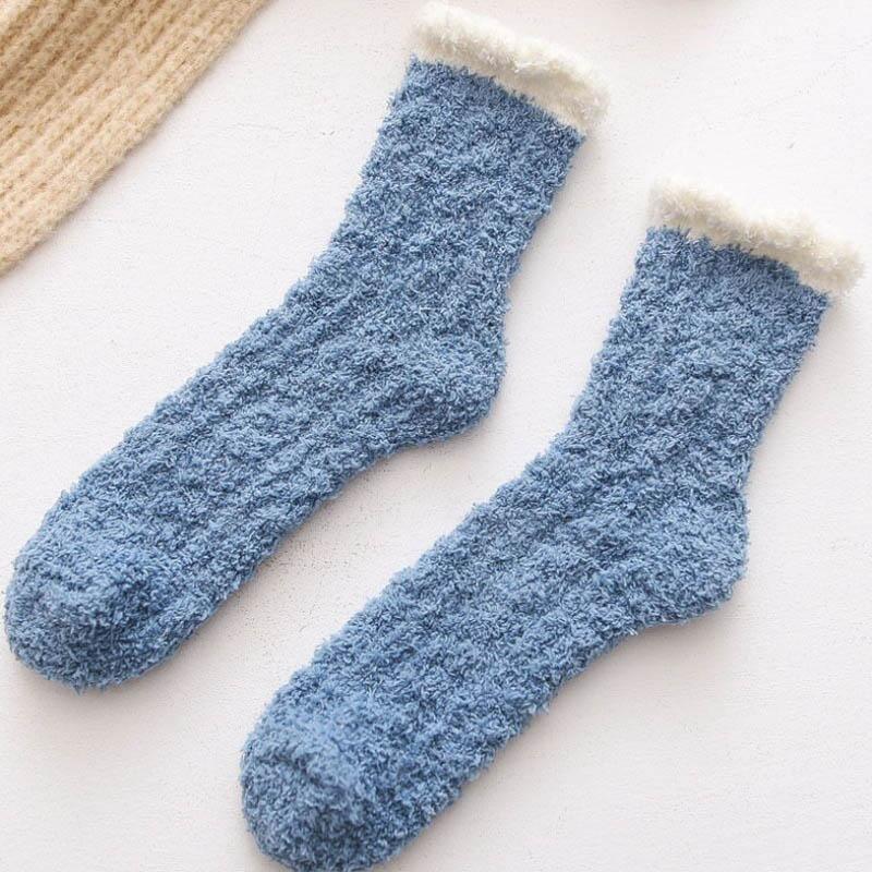 Close-up of the plush fleece lining inside women's thermal winter socks, showing warmth.