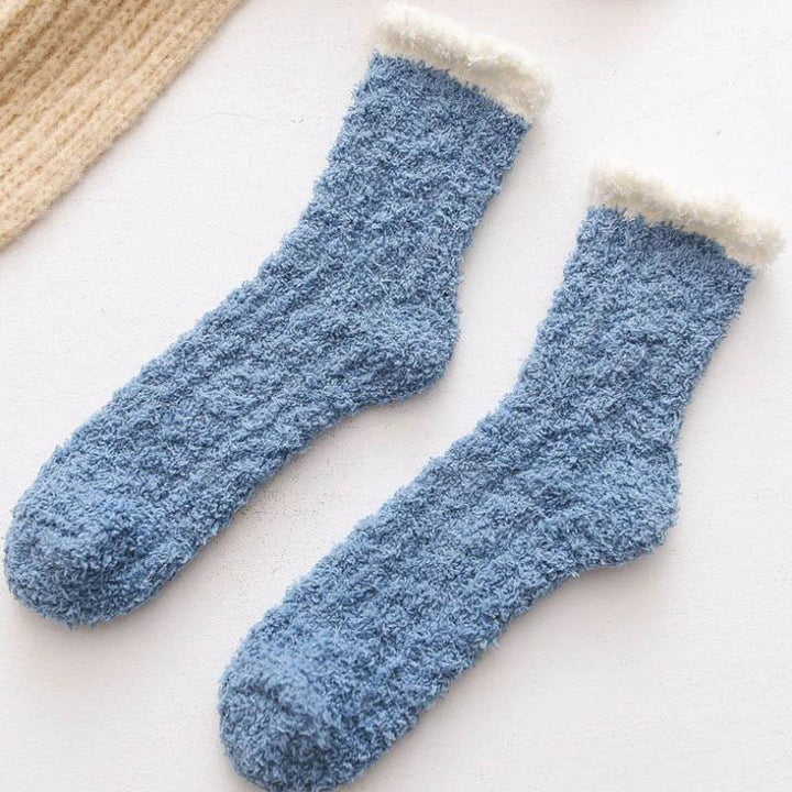 Close-up of the plush fleece lining inside women's thermal winter socks, showing warmth.