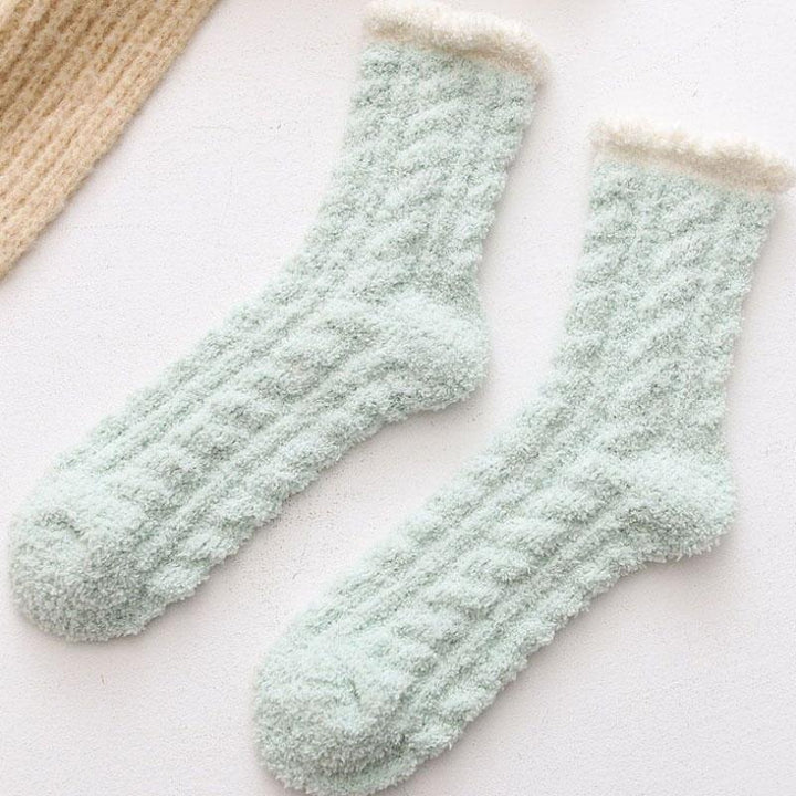 Detail shot of the knit texture on women's thermal winter socks, with a cozy feel.
