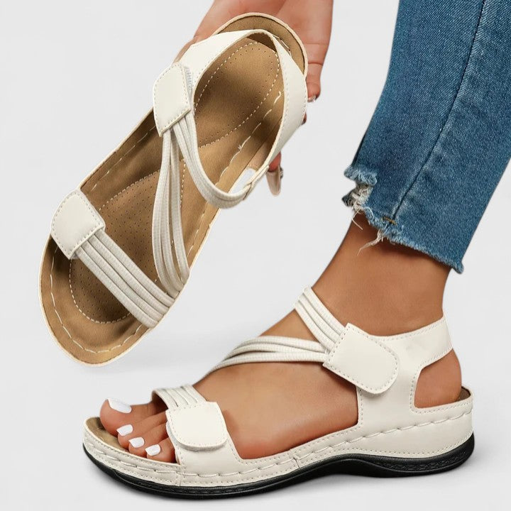 Comfortable women's orthopedic sandals with three-arch support, ideal for plantar fasciitis & flat feet.