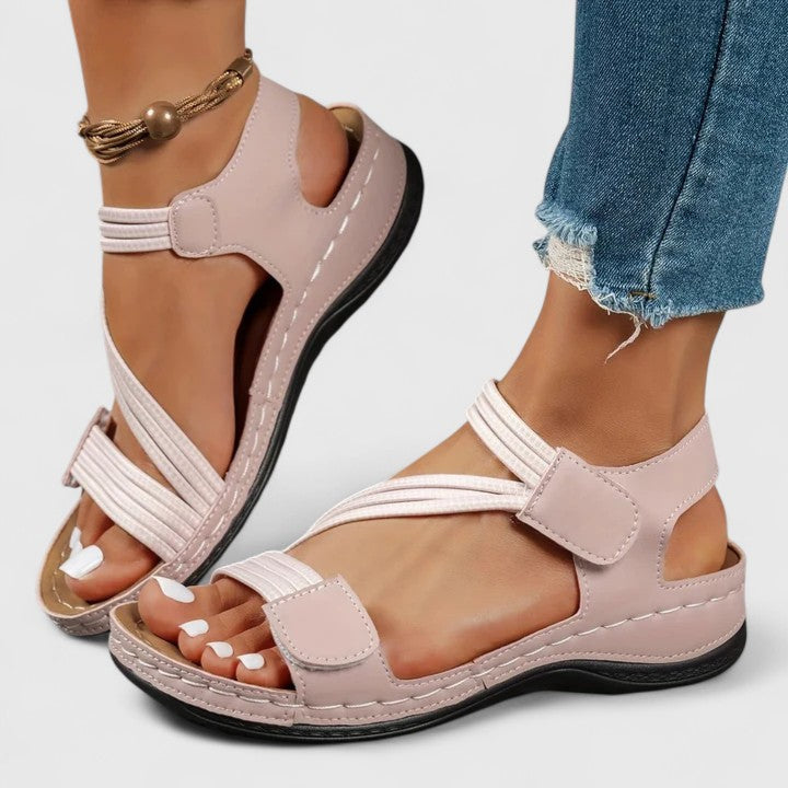 Summer footwear: women's orthopedic sandals with arch support for comfortable walks & flat feet relief.