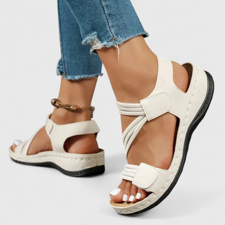 Stylish women's orthopedic sandals with three-arch support, providing all-day comfort & foot pain relief.