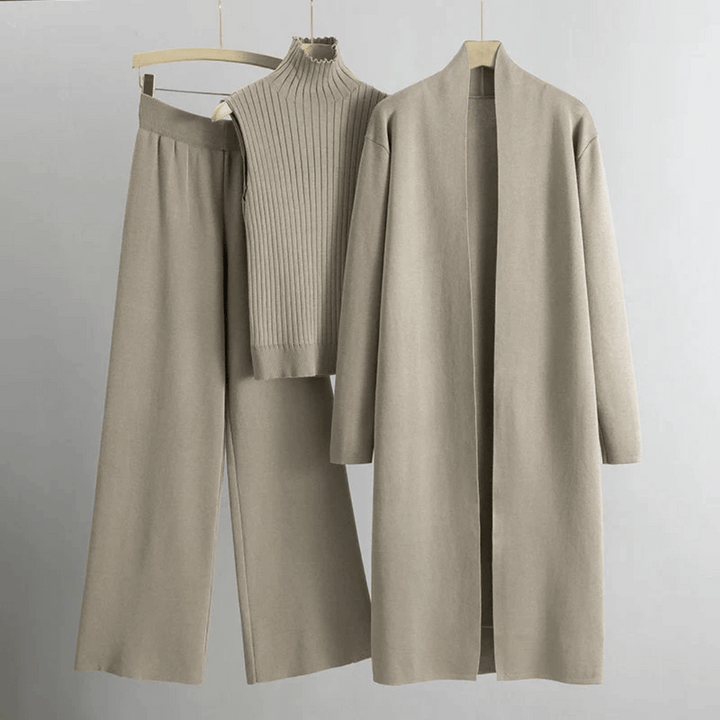 Stylish women's three-piece matching pant set with jacket, sleeveless top, and comfortable straight-leg pants