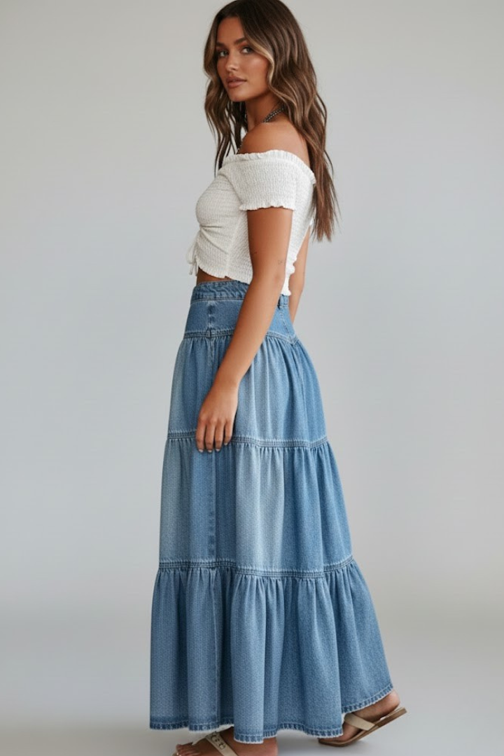 Casual women's high-waist denim maxi skirt with a chic tiered button-front detail. Everyday fashion.