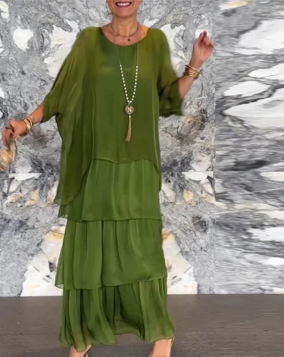 Everyday women's printed maxi dress with a tiered skirt & long sleeves, ensuring a relaxed and flowy fit.