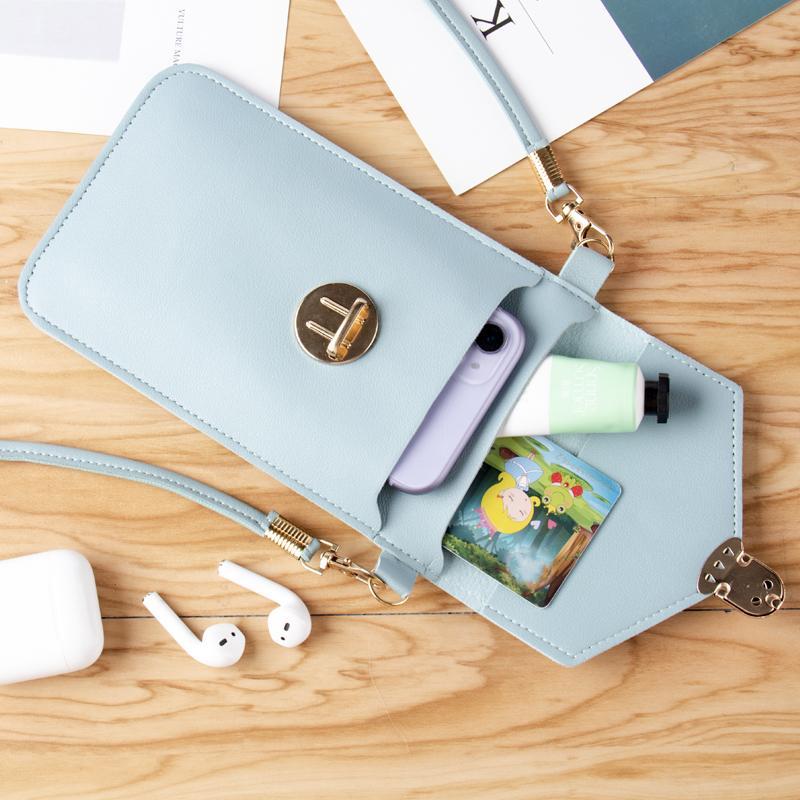 Angled view of a women's touchscreen mini bag, designed for convenience and style