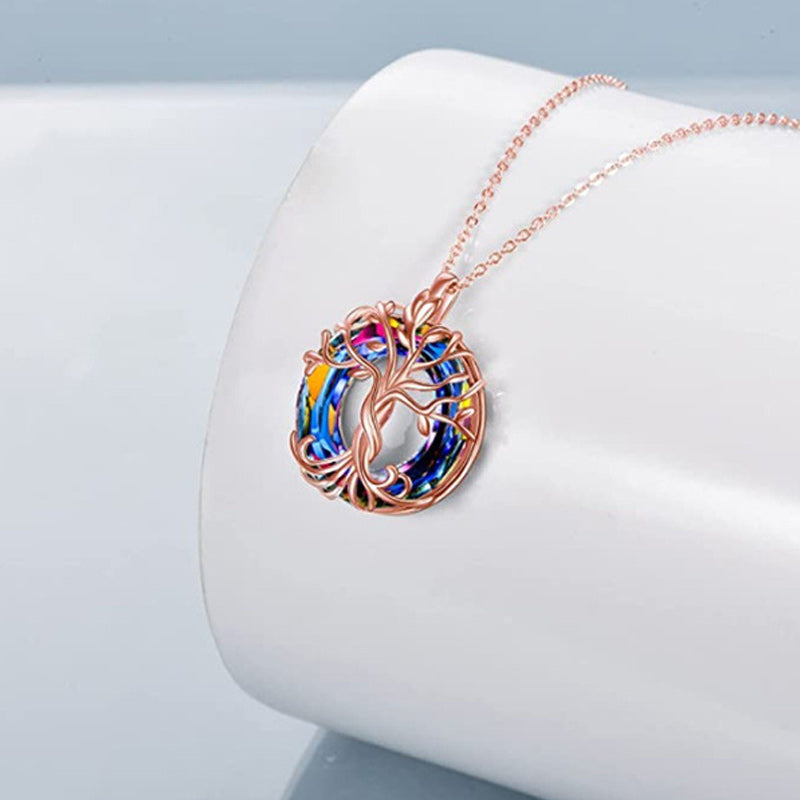 Stylish women's Tree of Life jewelry, an alloy pendant with a crystal-studded design on a fine necklace chain.