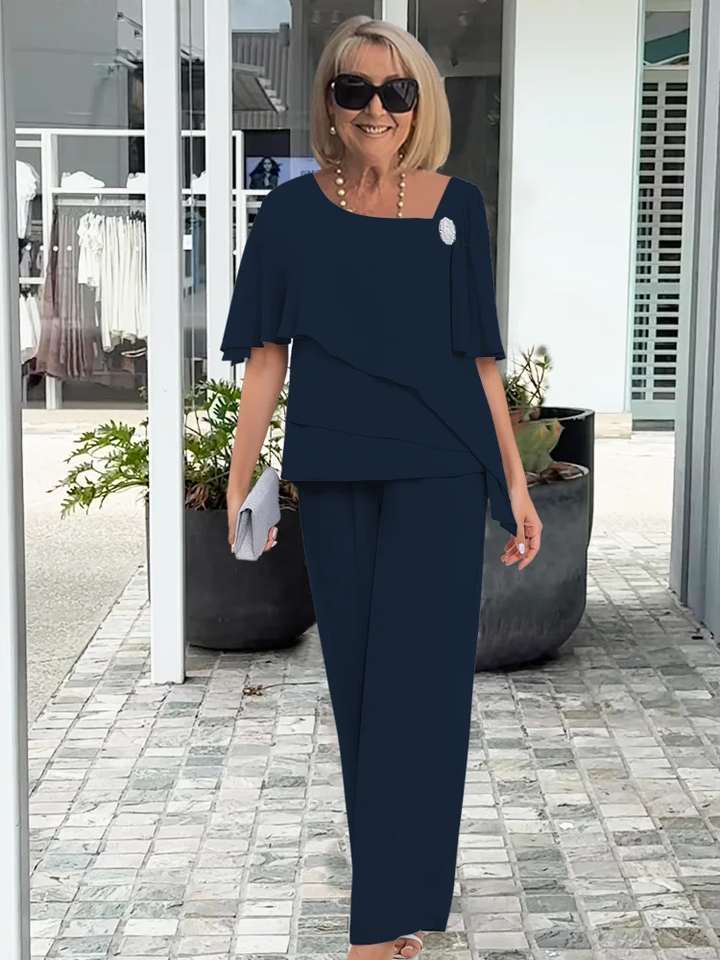 Effortless women's two-piece set: short sleeve top & straight leg pants. Perfect matching ensemble for spring/summer casual wear.