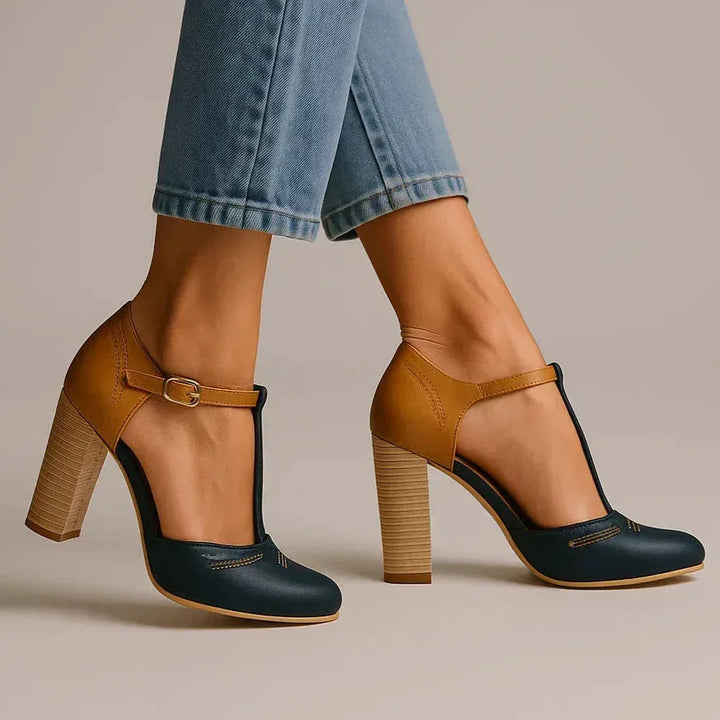 Fashionable two-tone block heel pumps for women, offering an elegant and comfortable look for any occasion.