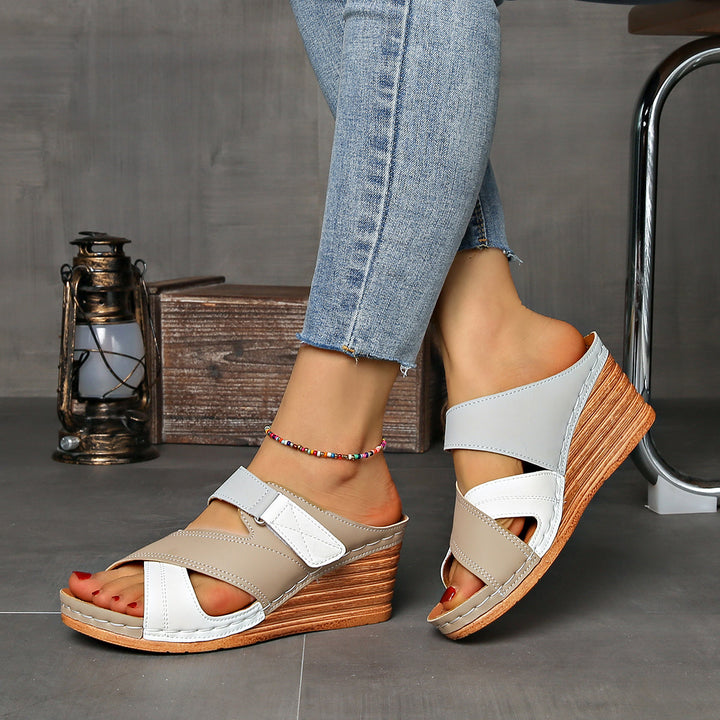 Stylish women's summer sandals: two-tone wedge slides with open toe. Perfect for casual comfort & beach fashion.
