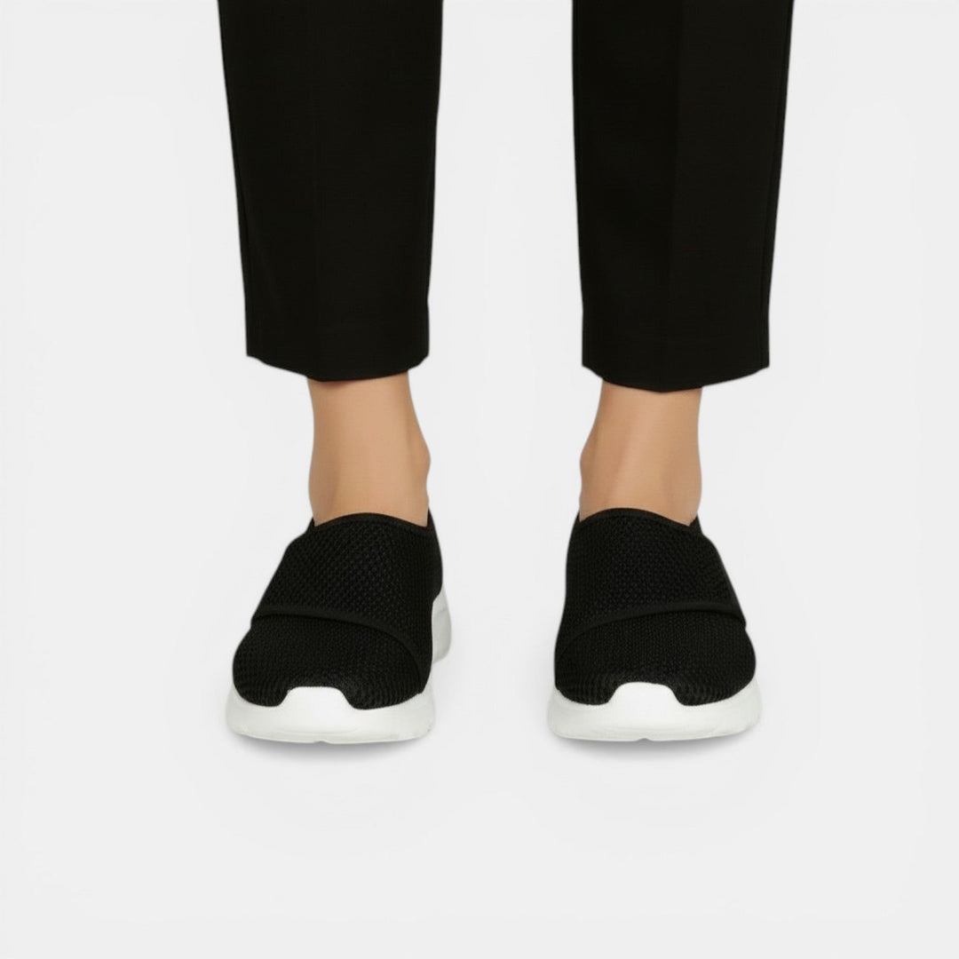 Women's athletic walking shoes, lightweight, breathable, and orthopedic for active daily wear & comfort.