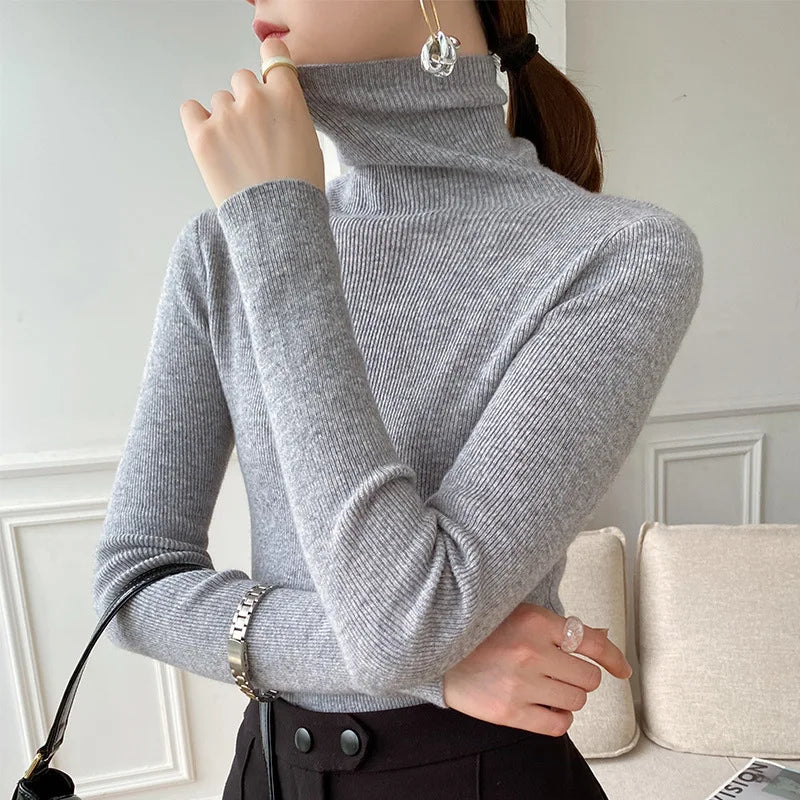 Premium women's ultra-soft cashmere turtleneck, a warm and versatile luxury knit for elegant layering.