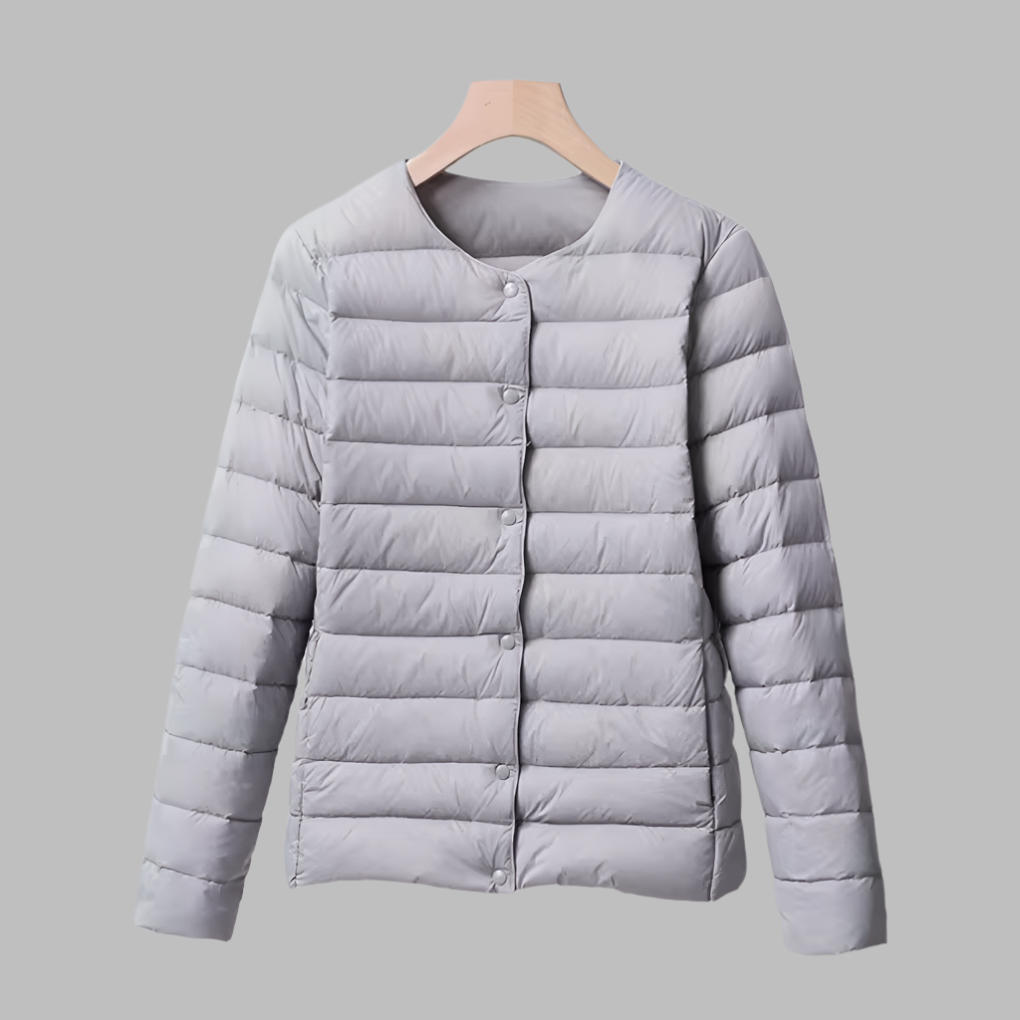 Versatile women's ultralight puffer jacket, collarless & packable. Essential outerwear for travel, spring & winter.
