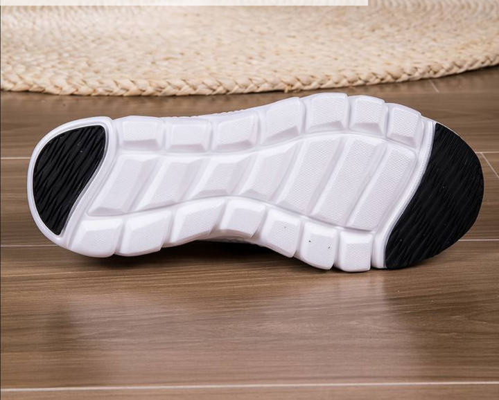 Flexible women's orthopaedic comfort shoes, ultralight for barefoot feel, promoting foot health & posture support.