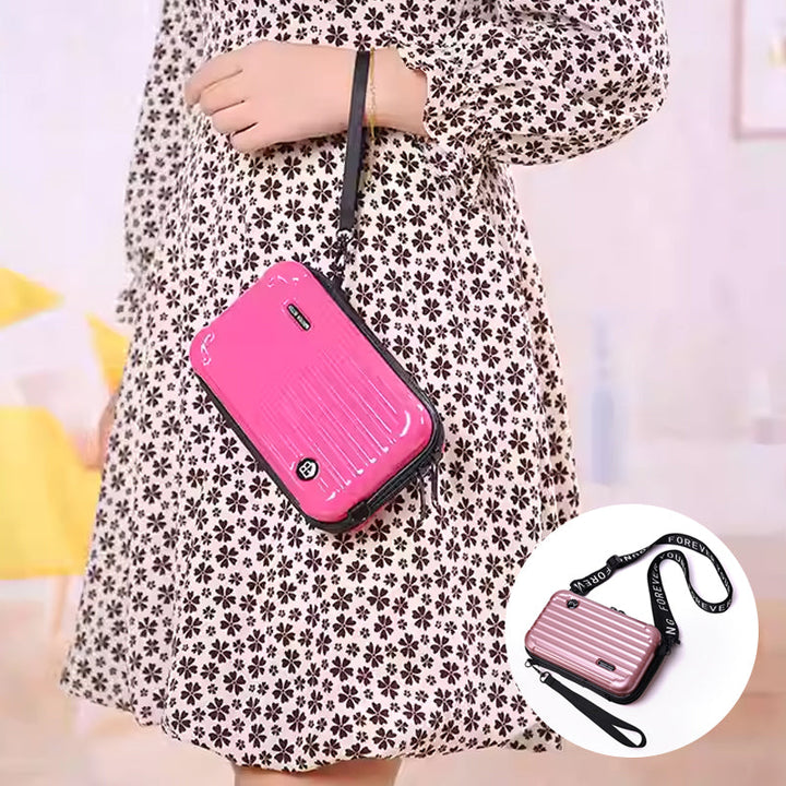 Women's unique mini pink suitcase crossbody bag with top handle and shoulder strap