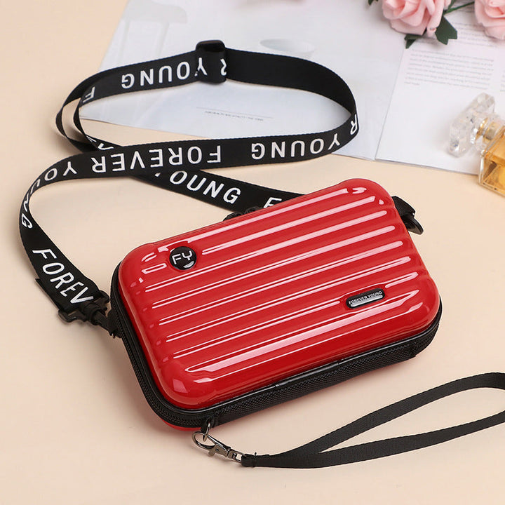 Women's mini suitcase crossbody bag, showcasing its unique suitcase shape