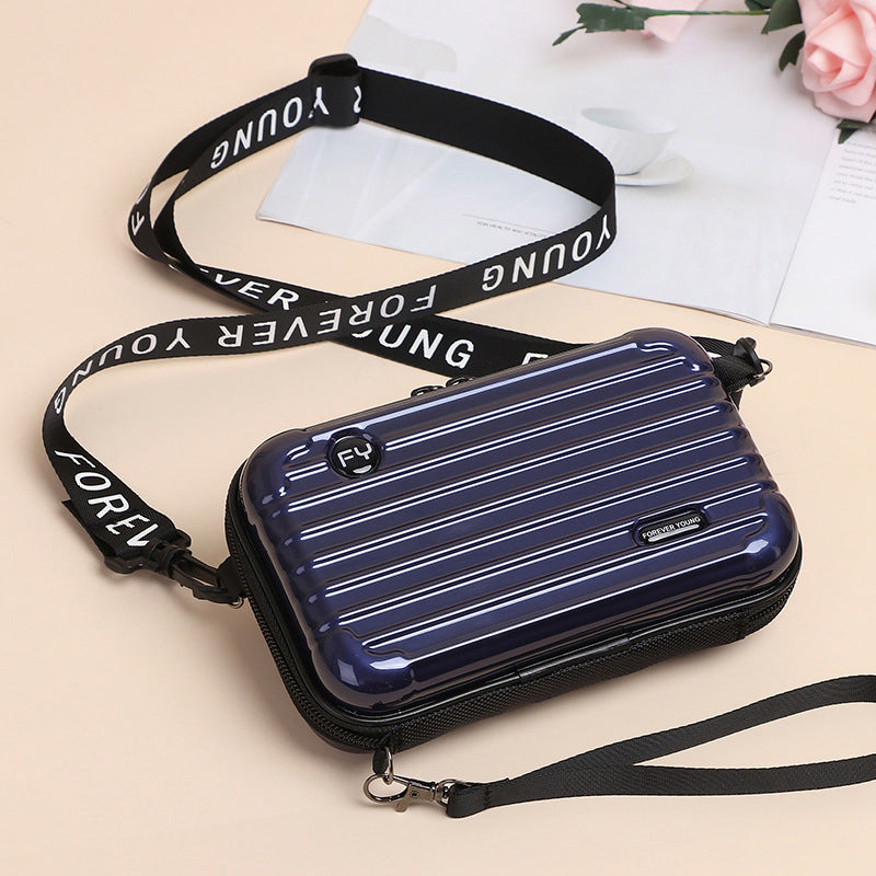Women's unique mini suitcase crossbody bag, blending novelty with practicality