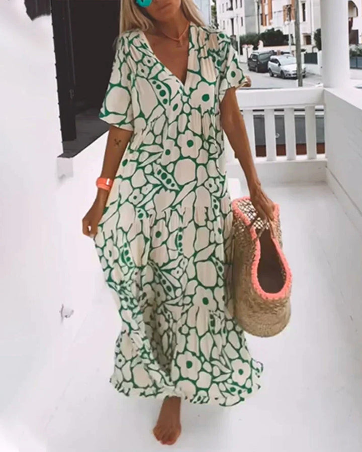 Casual yet stylish V-neck abstract maxi dress for women, ideal for sunny days and vacation adventures.
